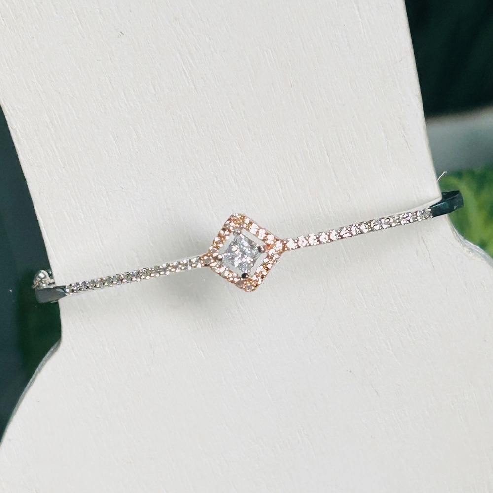 Elegant Crystal Bangle, with Pavé set stones, hinged opening and security latch.